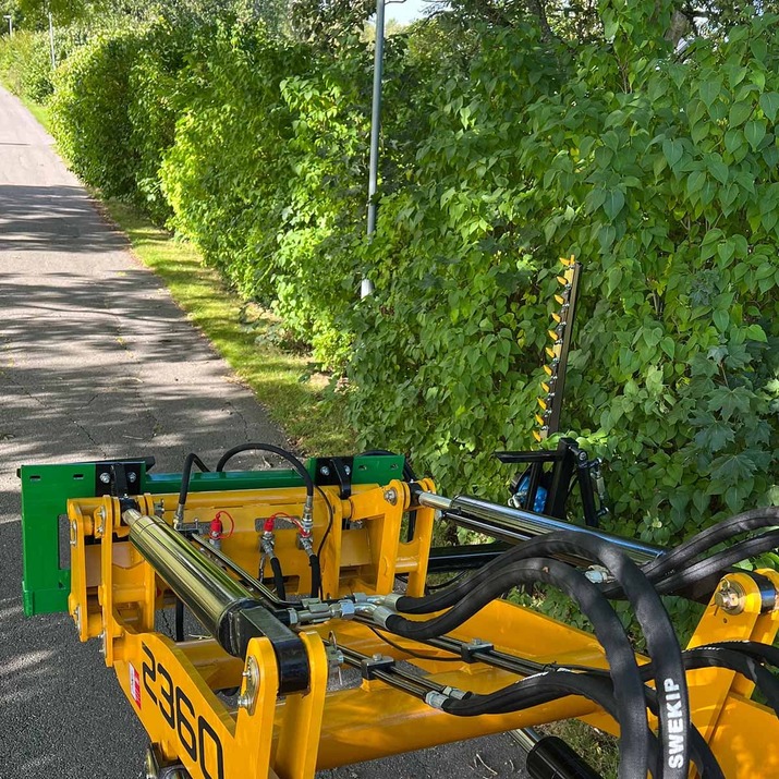 Häckklipp till frontlastare med bultat Trimafäste